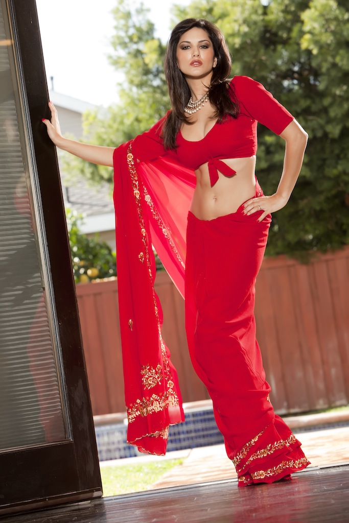 Sunny Leone Red Saree - Sunny Leone Busty Indian Pornstar is Super Sexy in a Sari